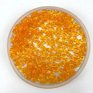 Detailed view of orange transparent 6mm star acrylic beads, perfect for DIY jewelry crafting.