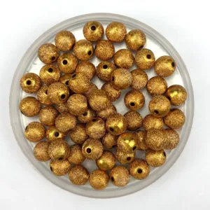 Gold acrylic frosted wrinkle beads, detail view of round DIY jewelry making accessories.