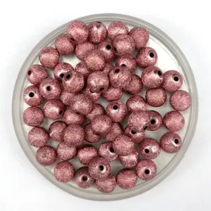 Pink acrylic frosted textured round beads for DIY jewelry making and craft accessories.
