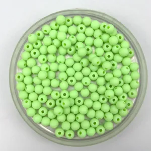Light green matte acrylic round beads for DIY handmade jewelry crafting and bracelet design.