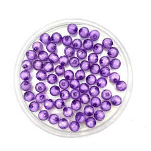 Detailed view of 8-16mm purple faceted acrylic beads, perfect for DIY jewelry making and crafts.