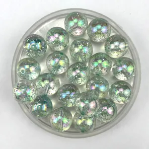 Transparent iridescent glitter round beads close-up detail for DIY craft accessories making.