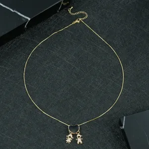 Cute boy and girl necklace with black heart pendant, fashionable gold clavicle chain detail.