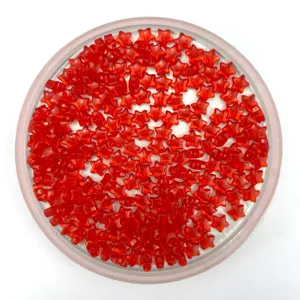 Detailed close-up view of red transparent star-shaped acrylic beads for DIY jewelry making accessories.