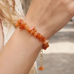 Chique armband van oranje onregelmatige stenen met verstelbare ketting, stijlvolle sieraden.