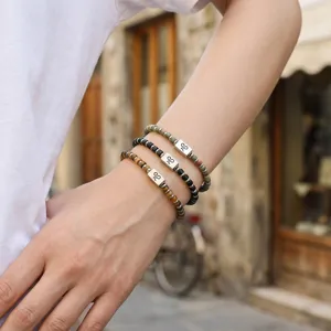 Heren 4mm natuurlijke tiger's eye en stenen kralen armband set met zilveren details.