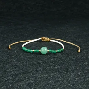 Handmade green gemstone beaded bracelet with adjustable braided rope, retro minimalist style.