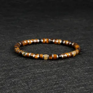 Tiger's eye gemstone and metallic disc beaded stretch bracelet detail view display