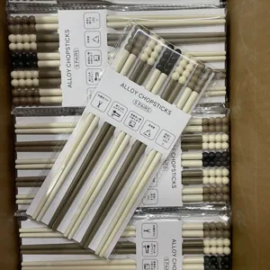Alloy chopsticks 5 pairs set with cute bead top design, heat resistant and dishwasher safe.