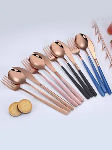 Rose gold stainless steel cutlery set with colorful handles for modern home kitchen dining.