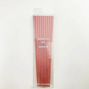 Set di bacchette in lega rosa in scatola trasparente, resistente al calore, stoviglie per uso.