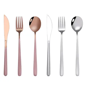 Stainless steel western cutlery set, elegant rose gold and silver knife fork spoon for home dining.