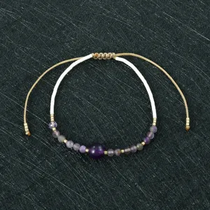 Handmade Miyuki seed bead bracelet adjustable purple crystal minimalist jewelry detail view.
