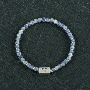 Stijlvolle 4mm blauwe steen kralenarmband voor heren, fijn metaal spacer ontwerp sieraad.
