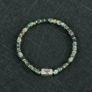 Heren kralenarmband van natuursteen met metalen spacers en stijlvolle hanger voor dagelijks.