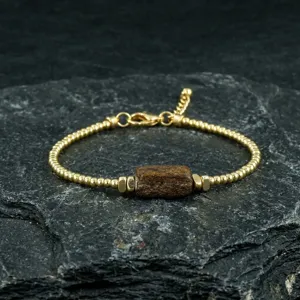 Detailed view of vintage natural brown stone crystal bead bracelet with gold adjustable chain.
