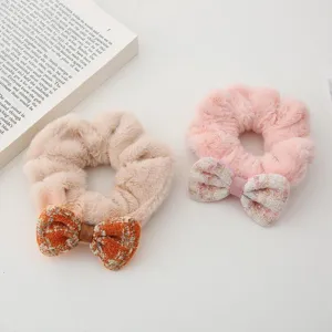 Cute plush hair scrunchies with chic tweed bowknot, soft winter hair accessories for women.