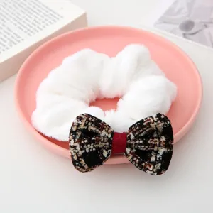 Plush hair scrunchie with tweed bowknot, soft winter hair tie for women and girls daily wear.