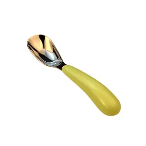 Children stainless steel deep spoon with yellow handle, ideal for baby feeding training.