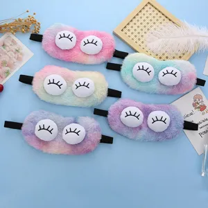 Cute plush sleep mask with big eyes, colorful tie-dye design, soft and comfortable for resting.