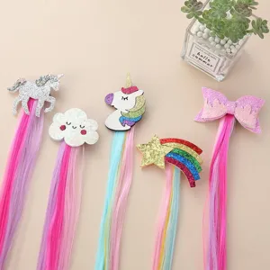 Kids colorful hair clips set featuring cute cartoon unicorn, rainbow, star, and bow.