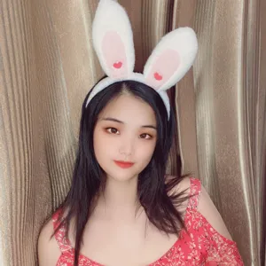 Cute plush bunny ear hairband detail with sweet heart pattern for daily cute wear.