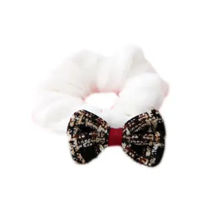 White plush hair scrunchie with tweed plaid bow knot, chic winter hair accessory for women.