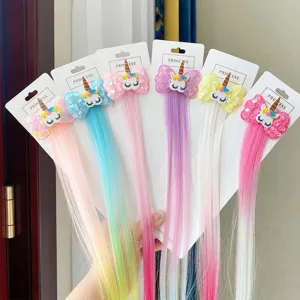 Children colorful hair extension clips with unicorn sequin bows, perfect for cute princess styling.