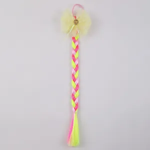 Children colorful wig braid detail showing the vibrant mesh bow and hair ring for cute styles.