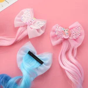 Colorful mermaid hair clip with mesh bow and long gradient wig for kids party styling.