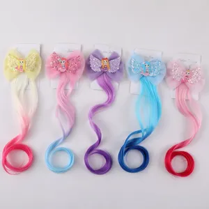Detailed view of colorful mermaid hair clips with gradient curly extensions for kids' parties.