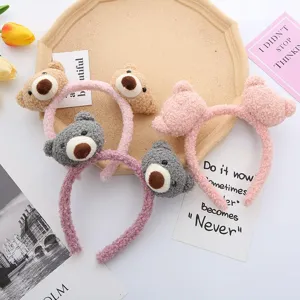 Detailed view of cute plush bear headband with soft texture and sweet daily hair accessory style.