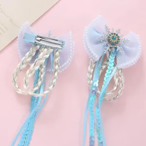 Mollette per capelli da principessa con fiocchi blu, trecce, paillettes e dolci fiocchi di neve.