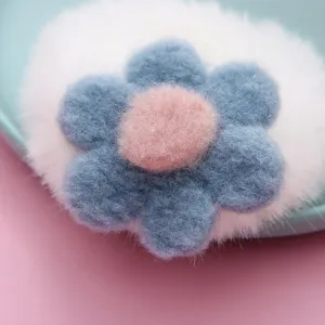 Plush flower hair scrunchie detail shot, soft texture, sweet candy color design for daily wear.