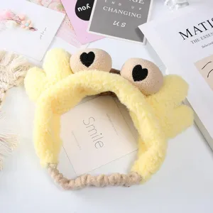 Cute yellow plush crab hairband with heart eyes, soft wide-brim headband for face washing.