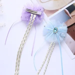 Kids hair clip with bow, mesh ribbon, and long braided extensions for girls princess dress up.