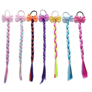 Extension per capelli intrecciati colorati per bambini con fiocco glitter, ideale per feste.