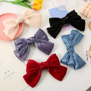 Satin bow hair clip, elegant large hair barrette for women and girls, stylish ponytail holder.