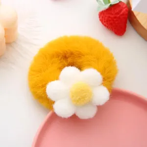 Fluffy yellow plush flower hair scrunchie cute winter hair tie for women and girls detail