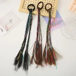 Detailed view of colorful braided hair extensions with elastic ties for kids daily performance.