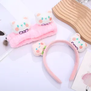 Cute plush cat and peach headband set for makeup, washing face, and spa routines. Pink soft hair.
