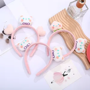 Cute plush cat peach hairband detail view, soft makeup headband for daily face washing and mask.