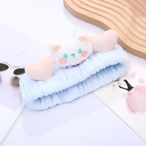 Cute cartoon plush headband for washing face, soft blue makeup hair band with cute wings.