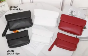 Detailed view of genuine leather solid color waist bags and crossbody purses in multiple colors.