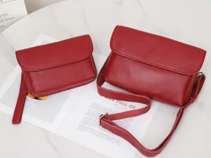 Stylish solid color genuine leather cross-body bag set with adjustable strap for daily use