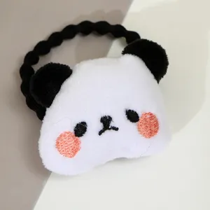 Cute cartoon panda plush hair tie close-up detail shot, soft fuzzy animal hair rope access
