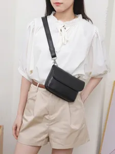 Black genuine leather crossbody waist bag, minimalist mini shoulder bag for women daily use.