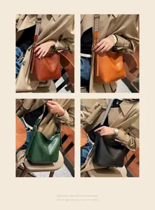 Detail view of vintage oil wax leather shoulder bag in multi colors with stylish wide strap.