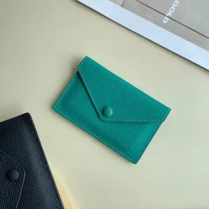 Porte-monnaie enveloppe en cuir véritable vert, mini étui à cartes minimaliste à pression.
