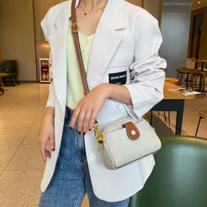 Stylish genuine leather crossbody bag for women, chic casual minimalist shoulder bag.